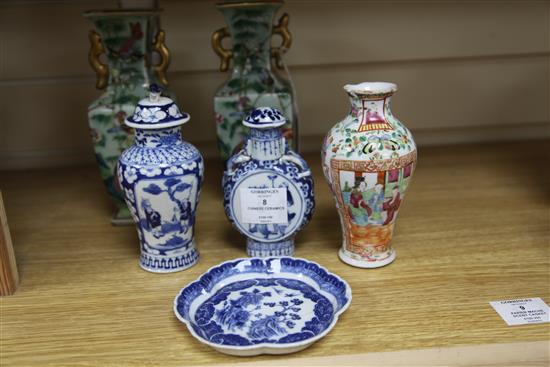 A pair of Chinese famille rose celadon ground vases, two blue and white vases and a spoon tray, all Qing dynasty